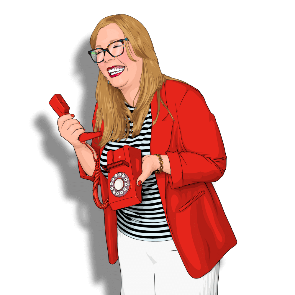 Michelle Hartley holding a red phone and laughing